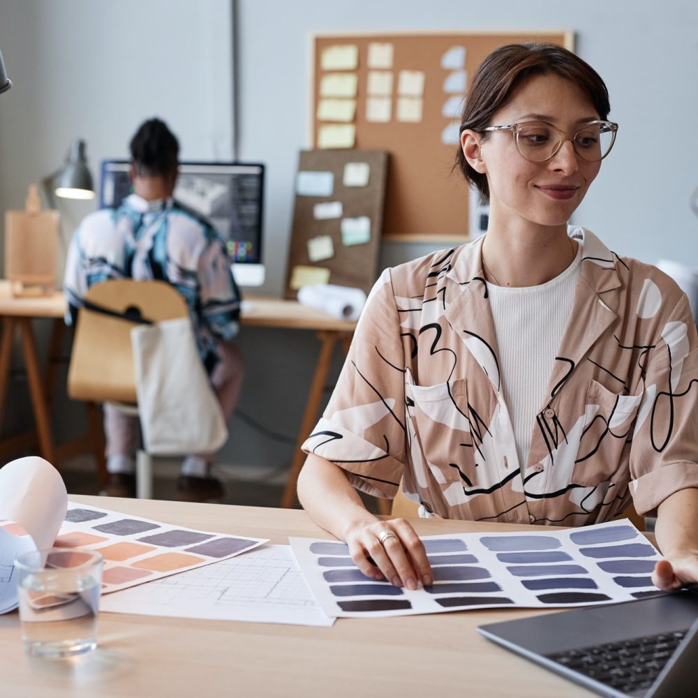 Young woman working on design project